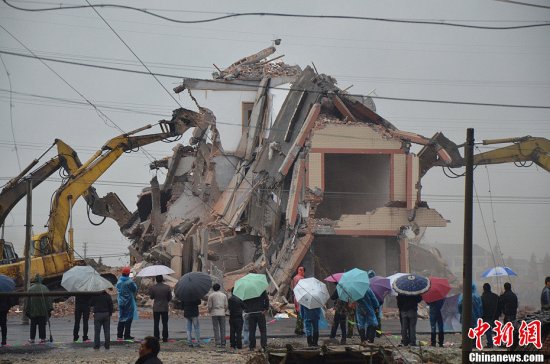 釘子戶羅保根同意拆遷了